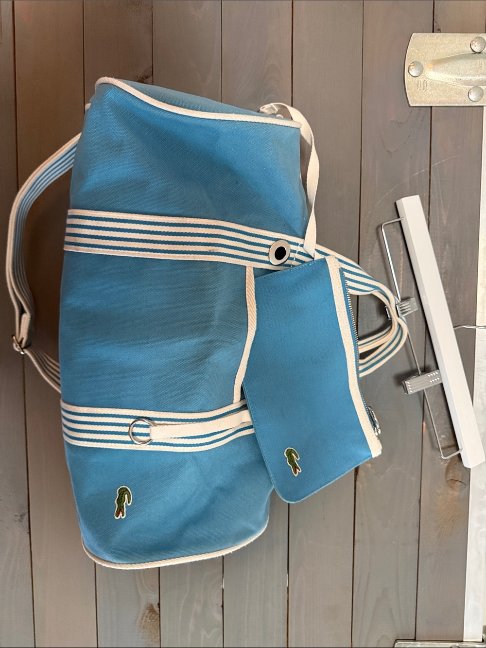 Lacoste Turquoise Canvas Duffel with Striped Accents and Pouch